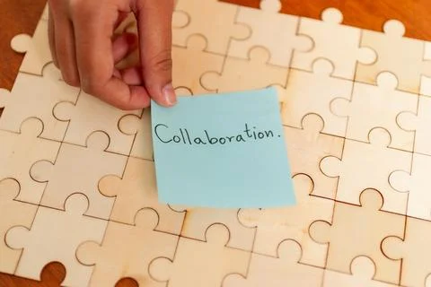 Celebrating teamwork highlights from a creative collaboration event in an i.. Stock Photos