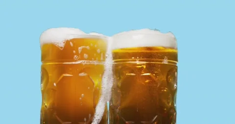 Celebration beer cheers concept - close up glasses of beer Stock Footage 160895045