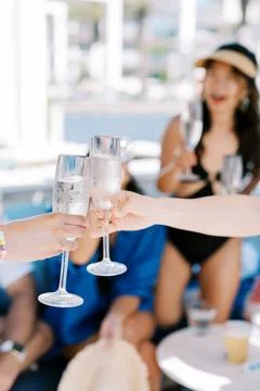 Celebration with Champagne by the Poolside Stock Photos