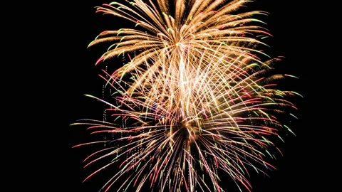Celebration fireworks isolated on black sky background. 4k motion video. Stock Footage 169525874