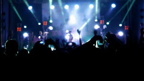 Celebration at holiday, feast. Music concert, fans and colorful illumination Stock Footage 77916583