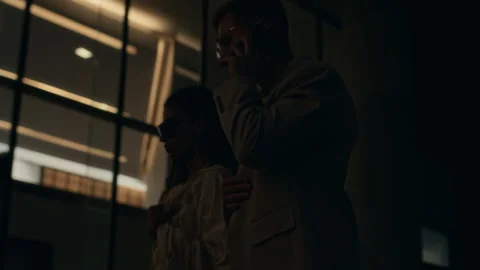 Celebrity Couple Going through Camera Flashes of Paparazzi at Night Stock Footage 281569788