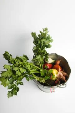 Celeriac and assorted vegetables in bucket Stock Photos