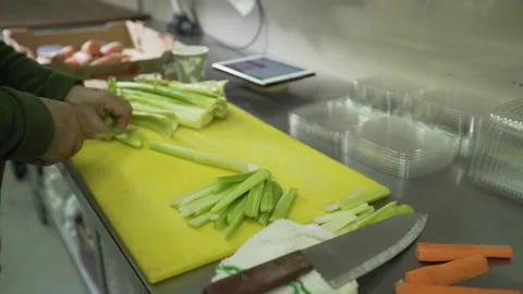 Celery being sliced Stock Footage 142157670
