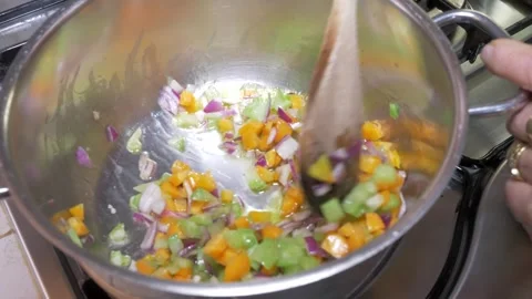 Celery, Carrots and Onion Soffritto Cooking in a Pot, Italian Home Kitchen 스톡 동영상 337955842