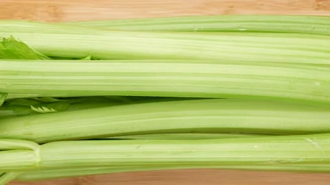 Celery on the kitchen board, dolly shot. Stock Footage 141367753