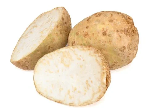 Celery root and its halfs isolated on white background. Close-up. Stock Photos