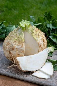 Celery root - celeriac, source of vitamins, fresh healthy vegetable, wedge Stock Photos