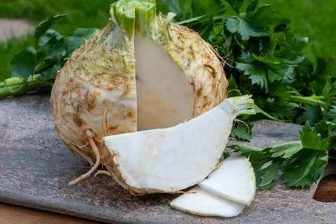 Celery root - celeriac, source of vitamins, fresh healthy vegetable, wedge Stock Photos