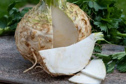 Celery root - celeriac, source of vitamins, fresh healthy vegetable, wedge Stock Photos
