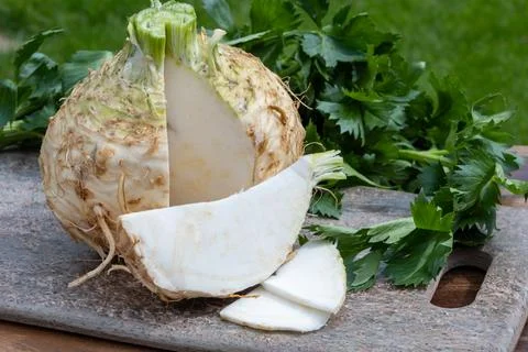 Celery root - celeriac, source of vitamins, fresh healthy vegetable, wedge Stock Photos