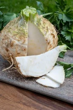 Celery root - celeriac, source of vitamins, fresh healthy vegetable, wedge Stock Photos