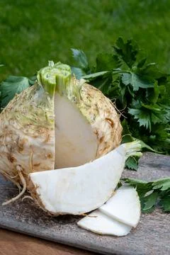Celery root - celeriac, source of vitamins, fresh healthy vegetable, wedge Stock Photos