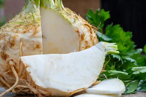 Celery root - celeriac, source of vitamins, fresh healthy vegetable, wedge Stock Photos