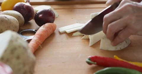 Celery root chopped into thin slices Stock Footage 146243990