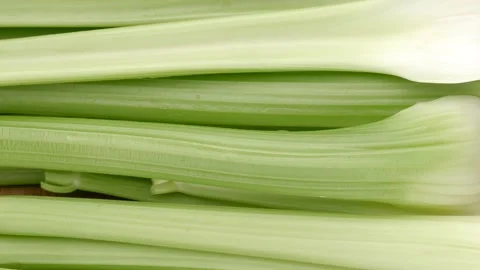 Celery stalk fresh on the kitchen board. Stock Footage 143815032