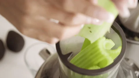 Celery Stalks Into Kitchen Blender Stock Footage 141600851