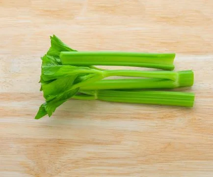 Celery On a wooden background Stock Photos
