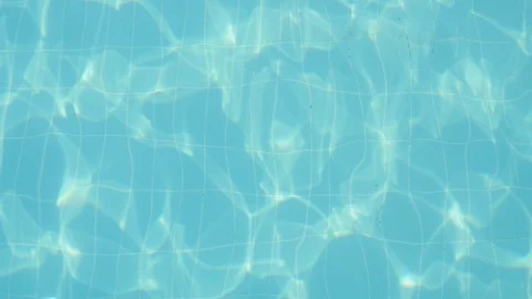 Celeste waters in a swimming pool rippling and swaying calmly in slow motion Stock-Footage 96443533