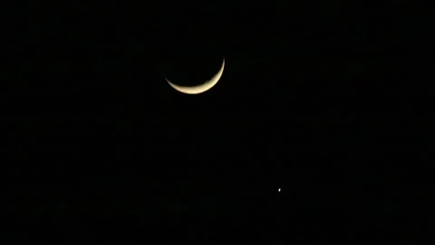 Celestial bodies Moon and planet Venus in the night sky. Stock Footage 337176826