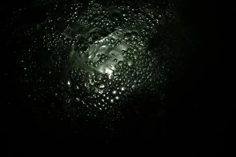 Celestial body lights up dark night, reflecting on liquid surface. Heavenly.. Stock Photos