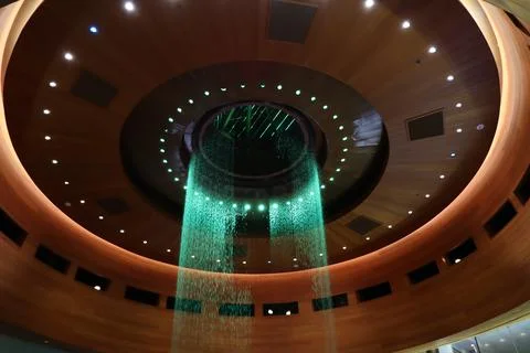 Celestial Cascade: Mesmerizing Circular Waterfall with Dynamic Lighting Stock Photos