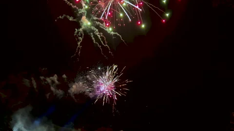 Celestial Celebration: Explosive Festive Fireworks Painting the Night Sky Video stock 255329466