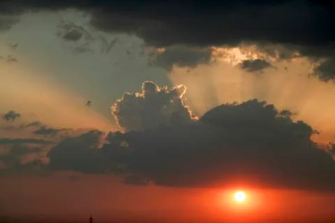 Celestial Drama during Sunset Stock Photos