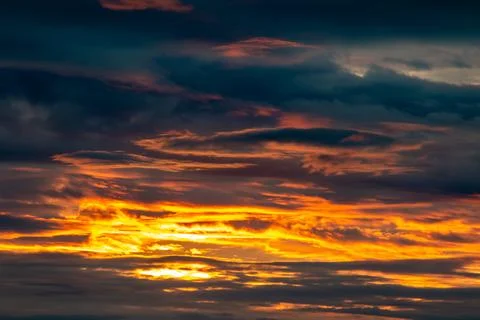 Celestial Drama - Sunset Cloud Forms Stock Photos