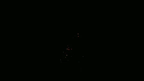 Celestial Fireworks. A stunning display of fireworks explodes in the night sky,  Stock Footage 302916758