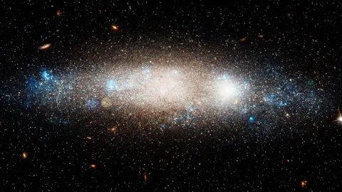 Celestial spiral galaxy rotating in outer space Stock Footage 122277432