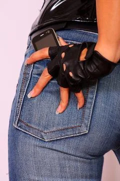 Cell phone in back pocket Stock Photos
