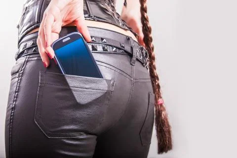 Cell phone in back pocket Stock Photos