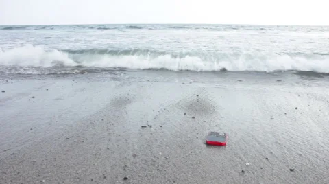 Cell Phone on Beach 4 Stock Footage 58837359