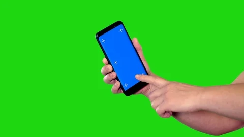 Cell phone with blue screen behind green screen Video stock 122388620