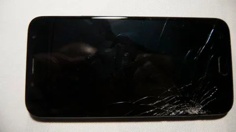 Cell phone with a broken screen Stock Photos