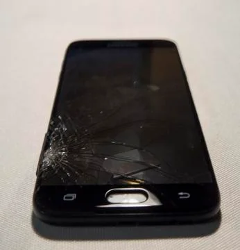 Cell phone with a broken screen Stock Photos