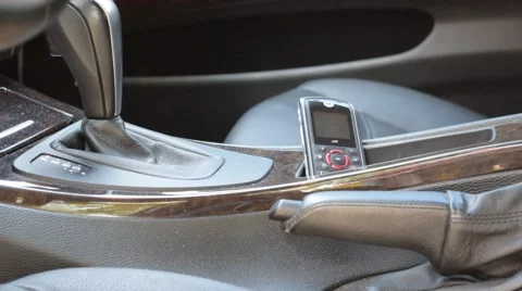 Cell phone in car console Stock-Footage 67366449