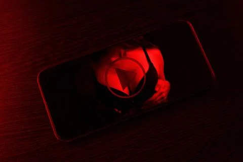 Cell phone on dark background Stock Photos