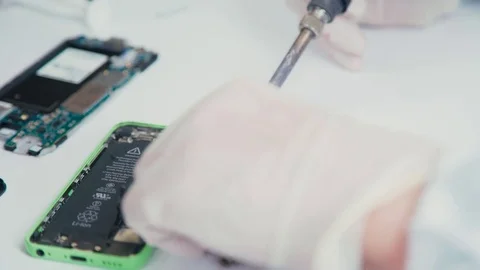 Cell phone disassembled into components: Li-ion mobile phone battery Stock-Footage 70076707