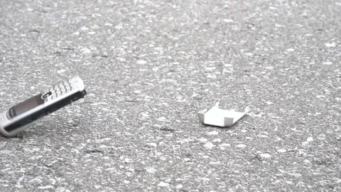 Cell phone fall to the ground and break into pieces Stock Footage 154549660