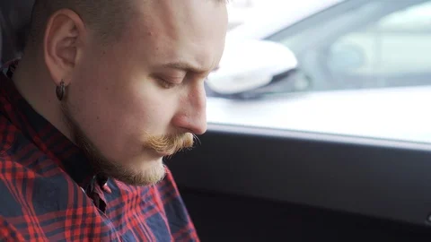 Cell phone with green screen in hands of man, in car, working in application Stock Footage 116762283