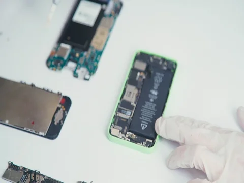 A cell phone repair. The internal components of a smartphone Stock Footage 70037629