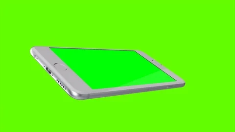 Cell phone rotating, with green screen background for chroma key. Stock Footage 70547357