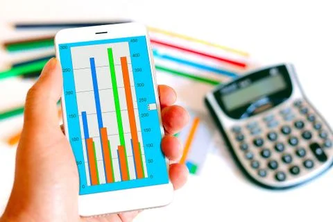 Cell phone with a statistical graph Stock Photos