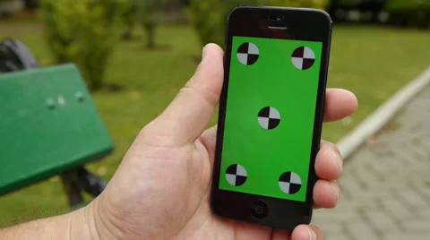 Cell Phone, touch screen, held by hands. Green screen Chroma Key. Close up. Stock Footage 33309756