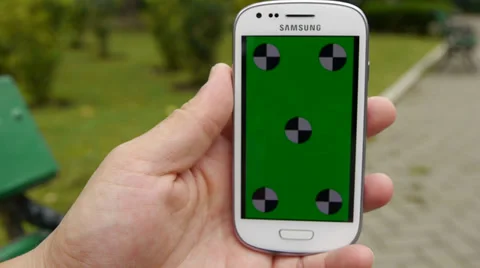 Cell Phone, touch screen, held by hands. Green screen Chroma Key. Close up. Stock Footage 33310823