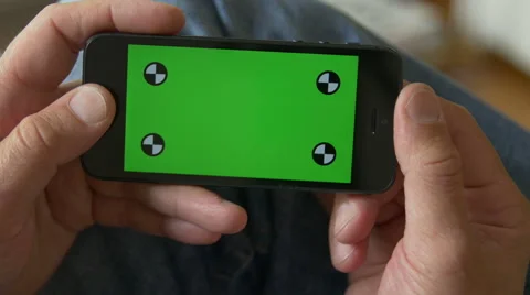 Cell Phone, touch screen, held by hands. Green screen Chroma Key. Close up. 4K Stock Footage 42251145