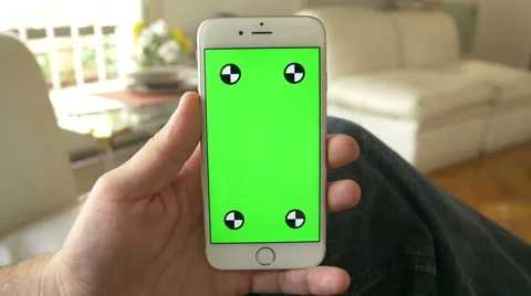 Cell Phone, touch screen, held by hands. Green screen Chroma Key. Close up. 4k Stock Footage 48513599