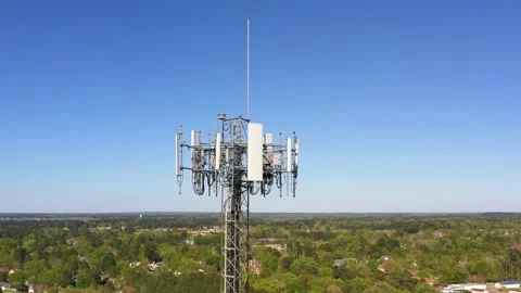 Cell phone tower above trees Stock Footage 178687870